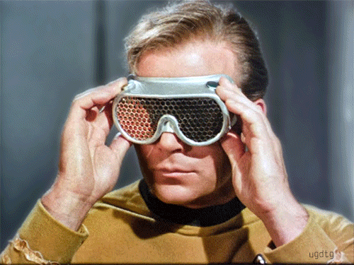 Star Trek Captain Kirk wearing a retrofuturistic rainbow laser mask